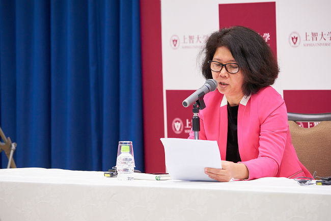 A photo of Dr.Ma Thida speaking on the presentation